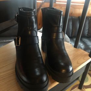 Black combat boots by Sam E Edelman